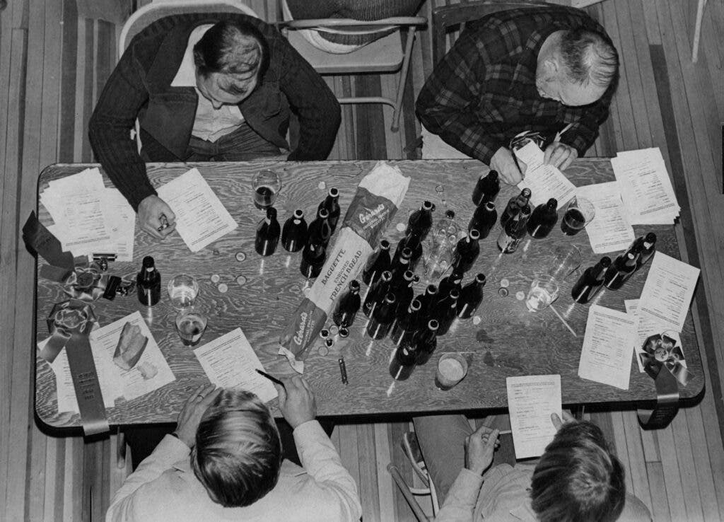 Bottles Of Beer On The Table Four judges mark their score sheets after tasting a variety of homemade brown brews this weekend at the Chautauqua Community House in Boulder for the third annual National Homebrew Conference and Competition.